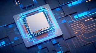 Computer chip lit up blue, photo by Getty Images/jiefeng jiang