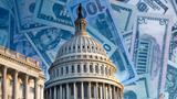 United States Capital Building superimposed over American bills of varying denominations, photo by Douglas Rissing/Getty Images