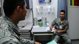 A medical officer conducts an annual health assessment with a senior airman at Dyess Air Force Base, Texas, August 28, 2019, photo by Staff Sgt. David Owsianka/U.S. Air Force
