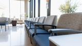Row of chairs in an empty medical clinic waiting room, photo by SDI Productions/Getty Images