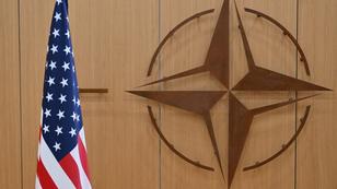A U.S. flag and the NATO logo at NATO headquarters in Brussels, Belgium, February 17, 2025, photo. by Nicolas Tucat/Reuters