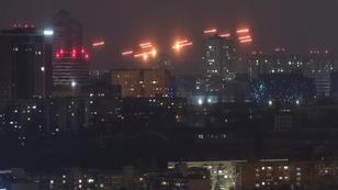 Tracers in the night sky as Ukrainian servicemembers fire at drones during a Russian drone strike in Kyiv, Ukraine, February 8, 2025, photo by Gleb Garanich/Reuters