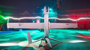An Aerovel Flexrotor unmanned aerial vehicle is inspected prior to launch on the flight deck of the guided-missile destroyer USS Paul Hamilton, photo by Elliot Schaudt/U.S. Navy