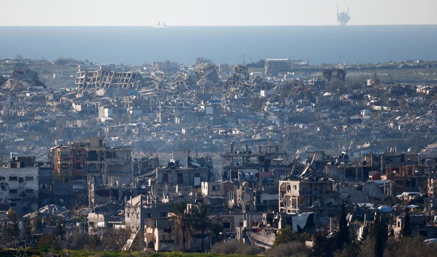 Destroyed buildings in North Gaza, as seen from Israel, March 2, 2025, photo by Amir Cohen/Reuters