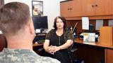 A soldier talks with a therapist, photo by U.S. Army