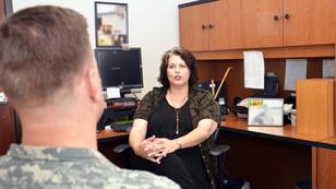 A soldier talks with a therapist, photo by U.S. Army