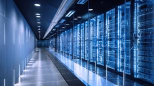 High-tech data center with server racks, photo by Nikada/Getty Images