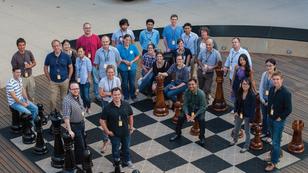 Students from the Frederick S. Pardee RAND Graduate School gather on the chess set outside of the RAND offices in Santa Monica, CA