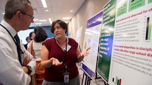 Inaugural student research showcase, photo by Diane Baldwin/RAND Corporation, p202002_06, showcase, posters, event, pardee rand, students, melissa dilaberti