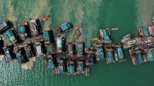 An aerial view of wooden pontoons equipped to dredge the seabed for deposits of tin ore off the coast of Toboali, on the island of Bangka, Indonesia, May 1, 2021, photo by Willy Kurniawan/Reuters