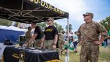 U.S. Army soldiers with the Wichita Recruiting Company hosted a recruitment booth at Hutchinson, Kansas, on September 9, 2023, photo by Pfc. Aiden Griffitts/U.S. Army