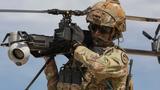 A soldier carries an Anduril Ghost UAS, photo by Charlie Duke/U.S. Army