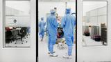 Assembly engineers work on a TWINSCAN DUV lithography system at ASML in Veldhoven, Netherlands, June 16, 2023, photo by Piroschka van de Wouw/Reuters