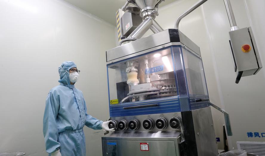 An employee producing biological drugs at a production workshop of a pharmaceutical company in Chongqing, China, March 6, 2024, photo by Costfoto/NurPhoto via Reuters