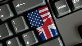 American and British flags form a button on a computer keyboard, photo by treenabeena/Adobe Stock