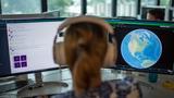 An analyst in the Joint Task Force-Space Defense Commercial Operations cell, photo by Bridget Bonnette/U.S. Air Force