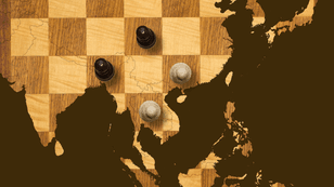 Old wooden chess board with map, photo by Chess board: ChrisAt/Getty Images/iStockphoto. Map: pc/Getty Images Chess pieces: TheUltimatePhotographer/iStockphoto