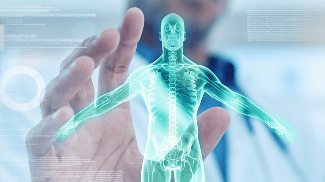 Man's hand reaching toward a computer-generated image of a human body, photo by James Cantwell/Canva